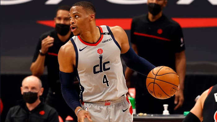 Wizard point guard Russell Westbrook dribbles a ball.